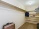 Walk-in closet features ample shelving and space for storage and organization at 1906 White Cedar Way, Brandon, FL 33511