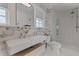 Modern bathroom featuring a glass-enclosed shower and stylish fixtures at 1920 Cherry Ne St, St Petersburg, FL 33704
