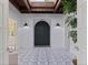 Foyer showcasing a skylight, textured walls, and stunning tile flooring at 1920 Cherry Ne St, St Petersburg, FL 33704
