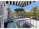 Outdoor deck features shaded lounge with green umbrella and views at 1920 Cherry Ne St, St Petersburg, FL 33704