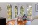 Bright sitting area with arched windows offering lush outdoor views and natural light at 1920 Cherry Ne St, St Petersburg, FL 33704