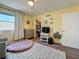 This bedroom features a ceiling fan, nice floors, and window for natural lighting at 2254 Springrain Dr, Clearwater, FL 33763