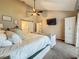 Relaxing main bedroom with sitting area, ensuite, and large windows for natural light at 2254 Springrain Dr, Clearwater, FL 33763
