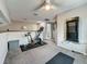 Upstairs workout area features exercise equipment with access to multiple rooms at 2254 Springrain Dr, Clearwater, FL 33763