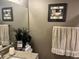 Stylish bathroom featuring coordinated decor and neutral tones at 2500 Winding Creek Blvd # B105, Clearwater, FL 33761