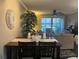 Inviting dining area with direct access to the relaxing living room at 2500 Winding Creek Blvd # B105, Clearwater, FL 33761