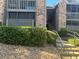 Inviting condo building featuring brick facade, well-maintained landscaping, and clear signage, enhancing curb appeal at 2500 Winding Creek Blvd # B105, Clearwater, FL 33761