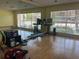 Well-lit fitness room equipped with a variety of equipment for a comprehensive workout at 2500 Winding Creek Blvd # B105, Clearwater, FL 33761