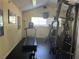 Fitness room showcasing a treadmill, weight machines and fitness posters on the wall at 2500 Winding Creek Blvd # B105, Clearwater, FL 33761