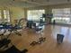 Fitness center with mirrors, exercise equipment, and ample space for various activities at 2500 Winding Creek Blvd # B105, Clearwater, FL 33761