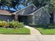 Exterior view of the community fitness center with well-maintained landscaping at 2500 Winding Creek Blvd # B105, Clearwater, FL 33761