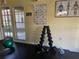Fitness center equipment includes free weights, exercise ball, and posted exercise guide at 2500 Winding Creek Blvd # B105, Clearwater, FL 33761