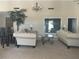 Cozy lounge with comfortable sofas, a glass coffee table, and decorative lighting for residents at 2500 Winding Creek Blvd # B105, Clearwater, FL 33761