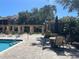Beautiful community pool and lounge area for relaxing by the water, perfect for residents at 2500 Winding Creek Blvd # B105, Clearwater, FL 33761