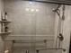 Shower with accessible features and tiled walls at 2500 Winding Creek Blvd # B105, Clearwater, FL 33761