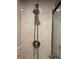 Updated shower has tiled walls and a handheld shower head for added convenience and versatility at 2500 Winding Creek Blvd # B105, Clearwater, FL 33761
