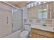 Bathroom featuring a shower/tub combo, vanity, and toilet at 2609 Lancaster Dr, Sun City Center, FL 33573