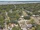 An elevated view of a neighborhood near a large body of water, showcasing nearby amenities at 2718 Boca Ciega N Dr, St Petersburg, FL 33710