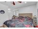 Bedroom featuring a wood-framed bed, closet, and window at 2718 Boca Ciega N Dr, St Petersburg, FL 33710