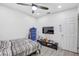 Bedroom with a bed, a television, and a foosball table at 2718 Boca Ciega N Dr, St Petersburg, FL 33710