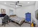 Bedroom featuring a bed, a desk, and a foosball table at 2718 Boca Ciega N Dr, St Petersburg, FL 33710