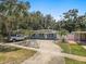 Charming single-story home boasts a well-maintained yard and plenty of parking at 2718 Boca Ciega N Dr, St Petersburg, FL 33710