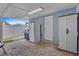 Covered patio with brick pavers, appliances, and plenty of storage space at 2718 Boca Ciega N Dr, St Petersburg, FL 33710