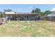 Large backyard with covered patio and plenty of space for entertaining at 2809 49Th N St, St Petersburg, FL 33710
