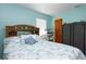 Light filled bedroom with natural light, a large bed and storage at 2809 49Th N St, St Petersburg, FL 33710