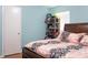 Bright bedroom features warm color palette and storage system at 2809 49Th N St, St Petersburg, FL 33710