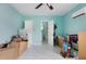 View of bedroom featuring tile floors, fresh paint, ceiling fan and bathroom access at 2809 49Th N St, St Petersburg, FL 33710