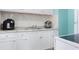 Kitchen featuring white cabinets, granite countertop, and stainless steel appliances at 2809 49Th N St, St Petersburg, FL 33710