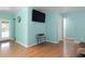 Bright living room with laminate floors and neutral walls at 2809 49Th N St, St Petersburg, FL 33710