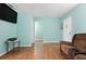 Light and bright living room with laminate wood floors at 2809 49Th N St, St Petersburg, FL 33710