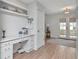 Bright home office with built in shelving, French doors, and lots of natural light at 2822 W Bay Ave, Tampa, FL 33611