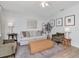 Comfortable living room features neutral decor, a plush sofa, stylish chairs, and a cozy rug at 2822 W Bay Ave, Tampa, FL 33611