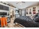 Spacious bedroom with tv, musical instruments, and modern decorations at 30217 Double Dr, Wesley Chapel, FL 33545