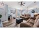 Welcoming living room with natural light, comfortable seating, and modern accents at 30217 Double Dr, Wesley Chapel, FL 33545