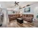 Inviting living room featuring cozy seating, modern lighting, and stylish decor at 30217 Double Dr, Wesley Chapel, FL 33545