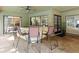 Covered patio bar with seating area overlooking the pool and backyard at 3305 Westmoreland Dr, Tampa, FL 33618