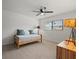 Bright bedroom with a daybed, ceiling fan, window with blinds, and decorative lamps at 3305 Westmoreland Dr, Tampa, FL 33618