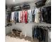 Spacious walk-in closet with ample storage, shelving and hanging space for clothes and accessories at 3305 Westmoreland Dr, Tampa, FL 33618