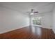 Bright bedroom with wood floors and a sliding glass door leading to the outside at 3325 Bayshore Blvd # A17, Tampa, FL 33629