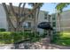 Bayshore Trace property exterior showcases balcony views and meticulous landscaping at 3325 Bayshore Blvd # A17, Tampa, FL 33629