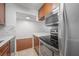 Efficient kitchen with a dishwasher, oven, and lots of cabinets at 3325 Bayshore Blvd # A17, Tampa, FL 33629