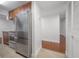 The kitchen features modern stainless steel appliances and warm wood cabinetry at 3325 Bayshore Blvd # A17, Tampa, FL 33629