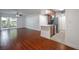 Open-concept living space showcasing wood flooring and connection to the kitchen at 3325 Bayshore Blvd # A17, Tampa, FL 33629