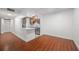 Living room boasting wood flooring and bright lighting next to an open-concept kitchen at 3325 Bayshore Blvd # A17, Tampa, FL 33629