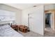 Bedroom with a comfortable bed and side table and natural light from window at 4325 93Rd N Ter, Pinellas Park, FL 33782