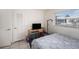 Bedroom with a comfortable bed and side table and natural light from window at 4325 93Rd N Ter, Pinellas Park, FL 33782